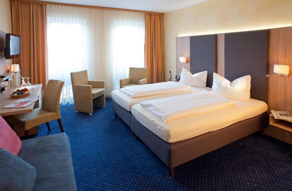 Stadthotel Pfeffermuehle غينغنباخ الغرفة الصورة